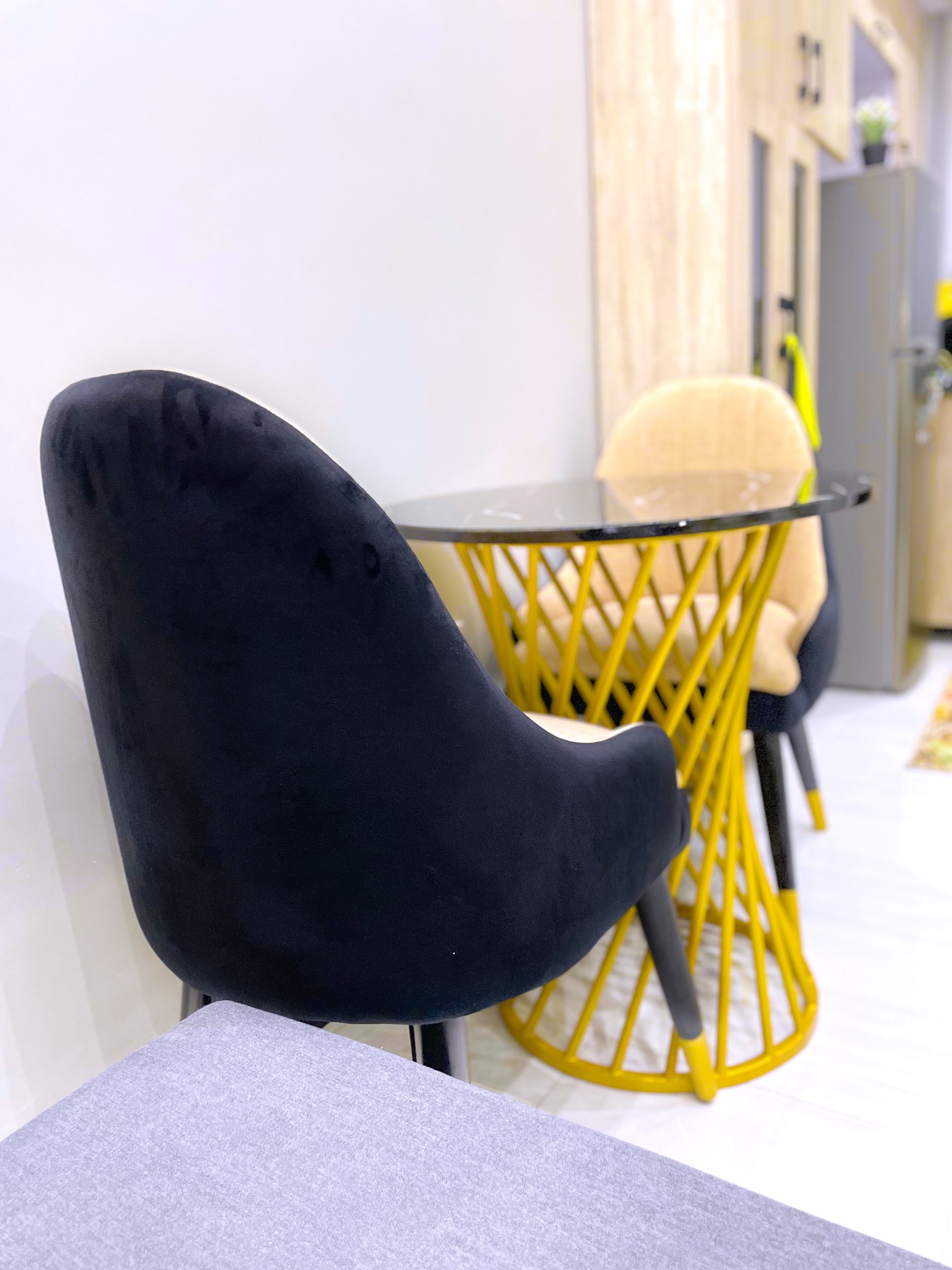 Dining area with modern chairs at SN Suites Apartments