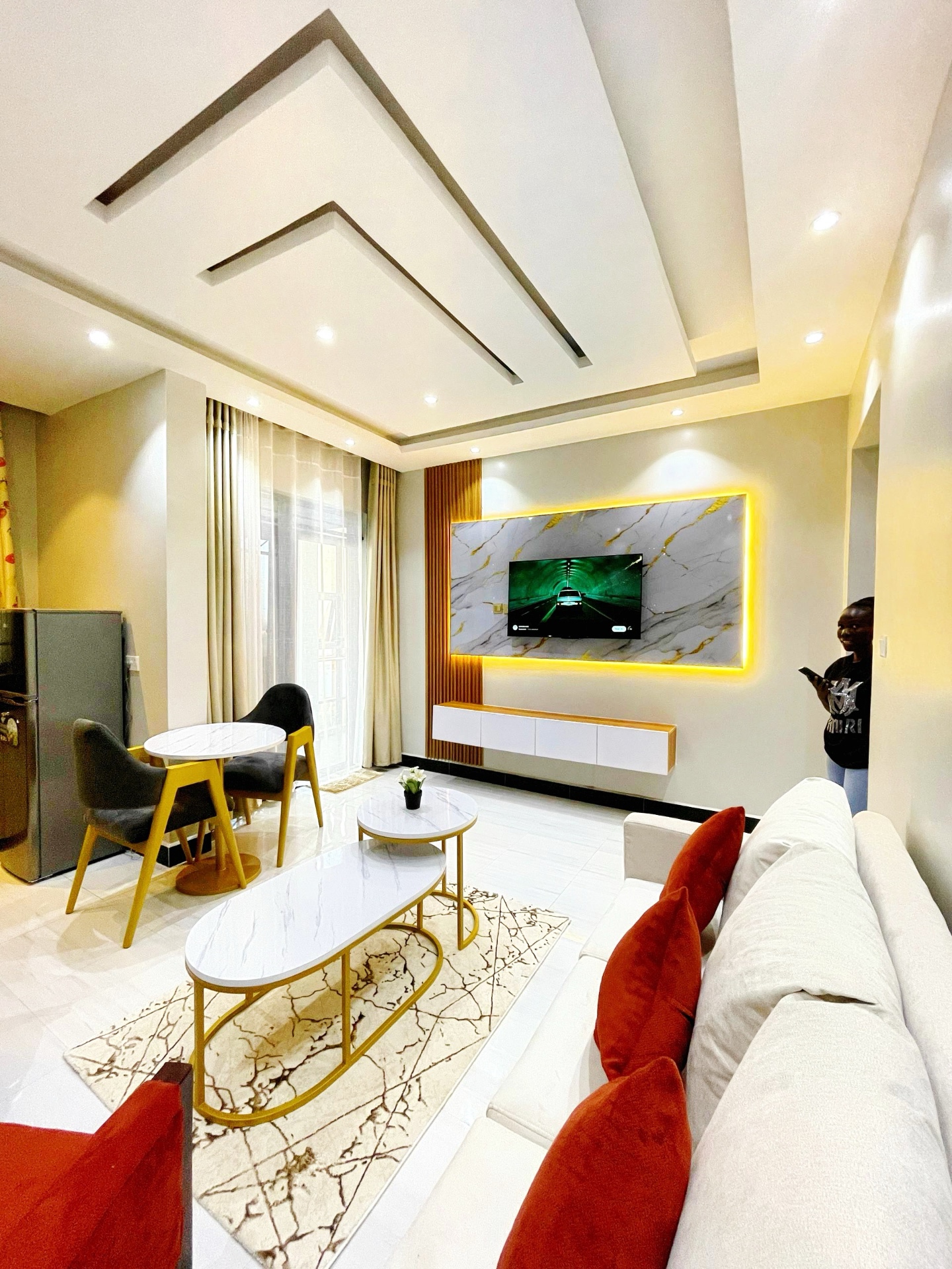 One-bedroom apartment living room at SN Suites Apartments